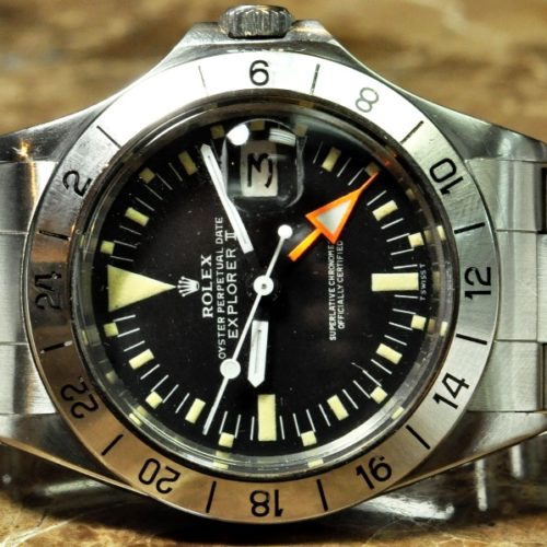 Rolex Explorer 2 Orange Hand Steve McQueen Vintage 1655 Movement - Automatic Caliber - 1570 Case - Steel 40mm Oyster Style Bracelet Dial - Black with Orange GMT hand Plastic Crystal in excellent condition Dial in excellent condition Bracelet - Excellent Condition Functions: Hours, Minutes, Seconds, Date, GMT Model: 1655 Serial: 4.3 million Year 1975 Excellent Condition with store box PreOwned Vintage Sale