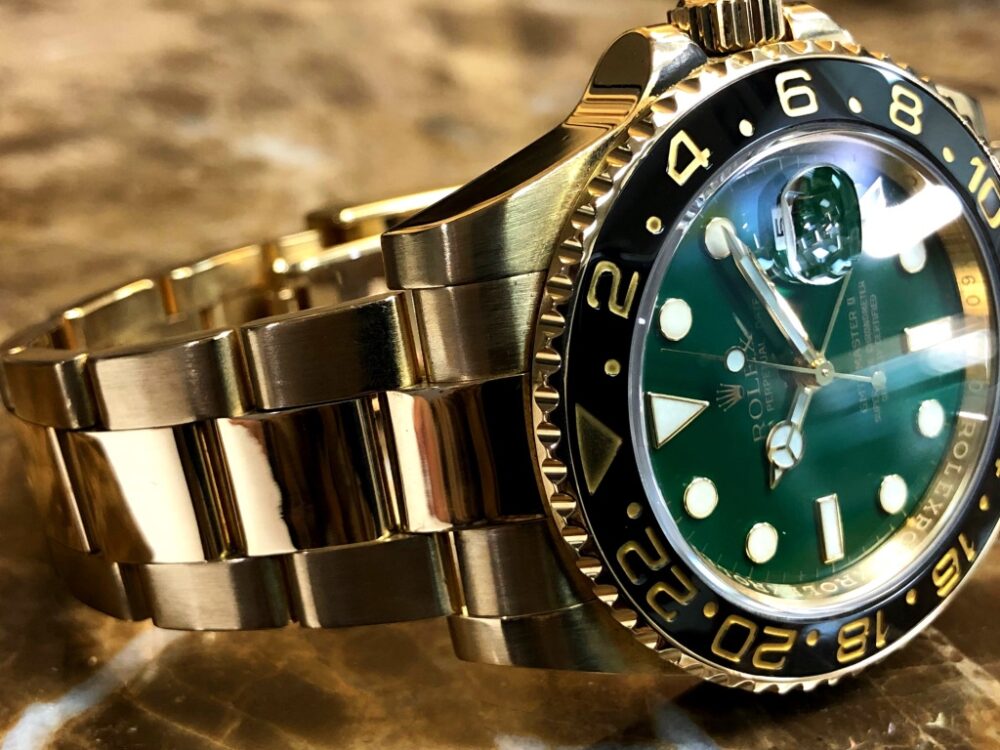 Rolex GMT Master II 18k Yellow Gold 116718 Green Dial Black Ceramic Box Papers 50th Anniversary