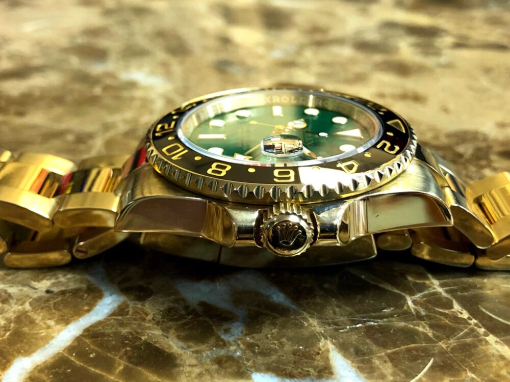 Rolex GMT Master II 18k Yellow Gold 116718 Green Dial Black Ceramic Box Papers 50th Anniversary