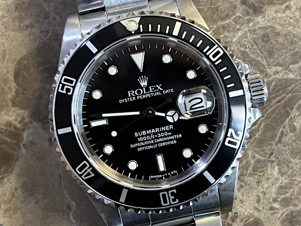 Rolex Submariner with Date Swiss – T