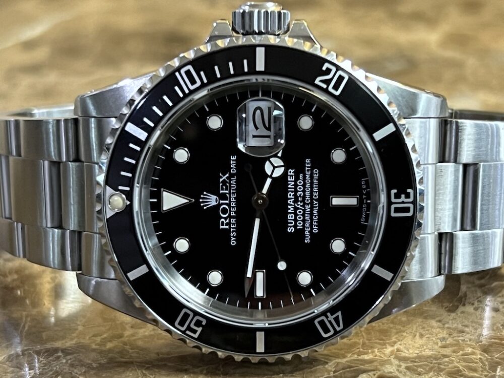 Rolex Submariner with Date Swiss – T