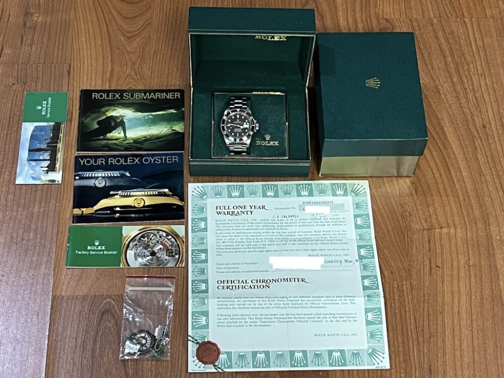 Rolex Submariner with Date Swiss – T