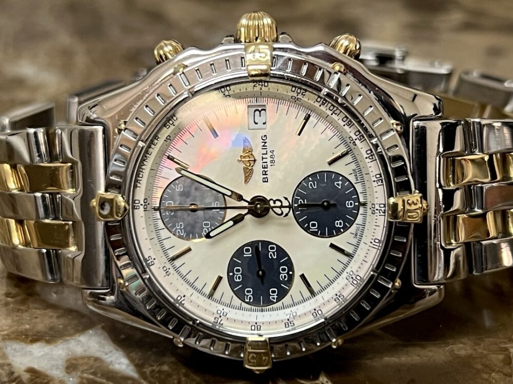 Breitling Chronomat 18k Gold / Steel automatic 40.5mm White Mother of Pearl Dial with Blue Subs and 18k Gold and Steel Bracelet B13050.1