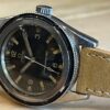Omega SEAMASTER 300 Vintage Bakelite Bezel 39mm Automatic Caliber 550 with heavy matching patina 165.014-63 year 1963