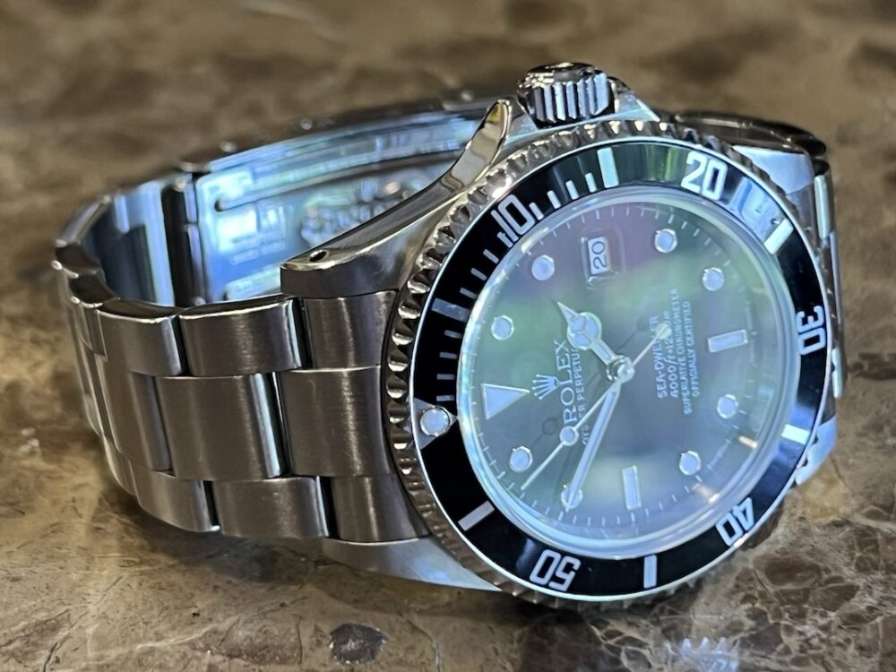 Rolex Sea Dweller 4000 model 16600 K Year 2001 40mm Automatic Box Papers