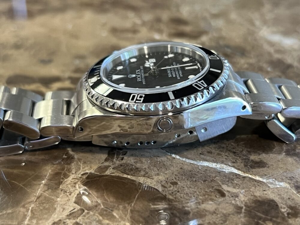 Rolex Sea Dweller 4000 model 16600 K Year 2001 40mm Automatic Box Papers