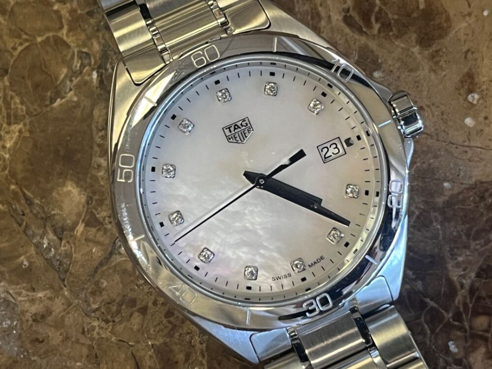 Tag Heuer formula one quartz 35mm mid size mother of pearl dial with box and papers