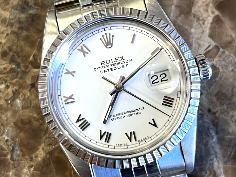 Rolex Oyster Perpetual Datejust 36 Automatic with White Roman Dial Black Hands Jubliee Bracelet model 16030