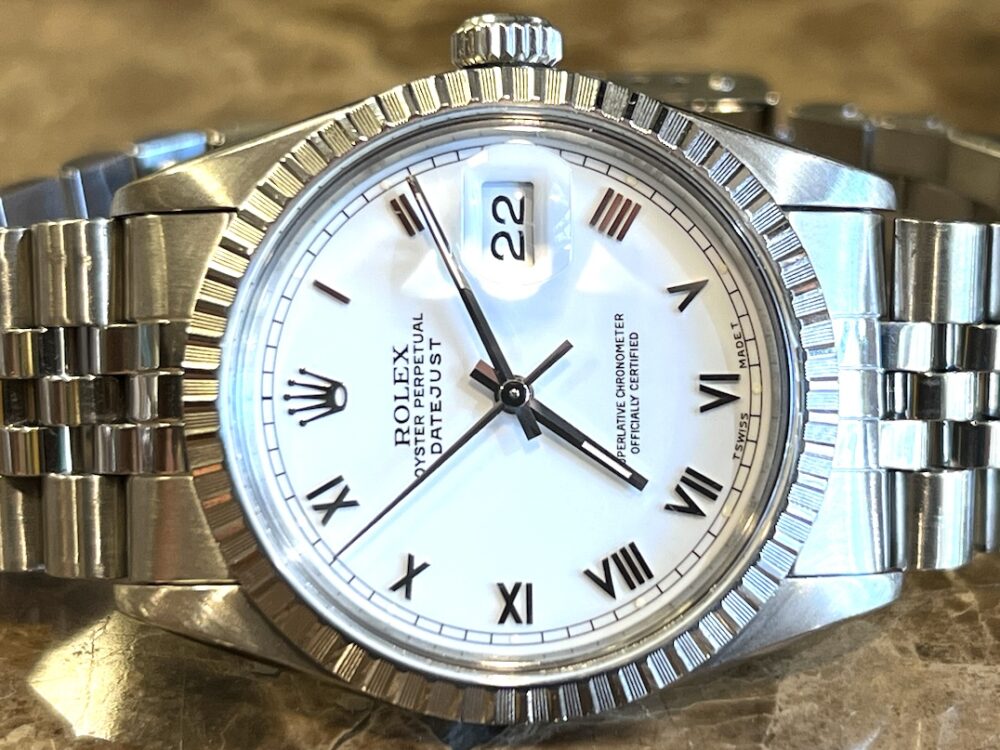 Rolex Oyster Perpetual Datejust 36 Automatic with White Roman Dial Black Hands Jubliee Bracelet model 16030