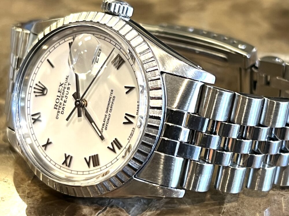 Rolex Oyster Perpetual Datejust 36 Automatic with White Roman Dial Black Hands Jubliee Bracelet model 16030