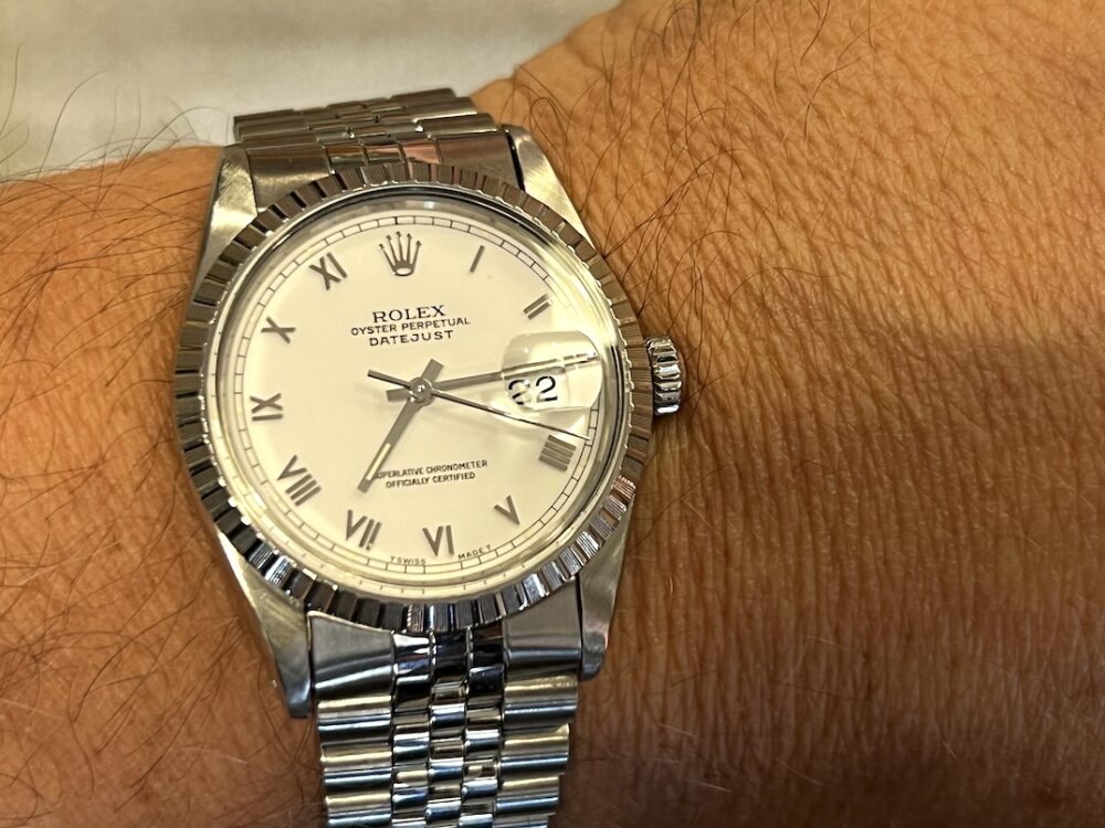 Rolex Oyster Perpetual Datejust 36 Automatic with White Roman Dial Black Hands Jubliee Bracelet model 16030