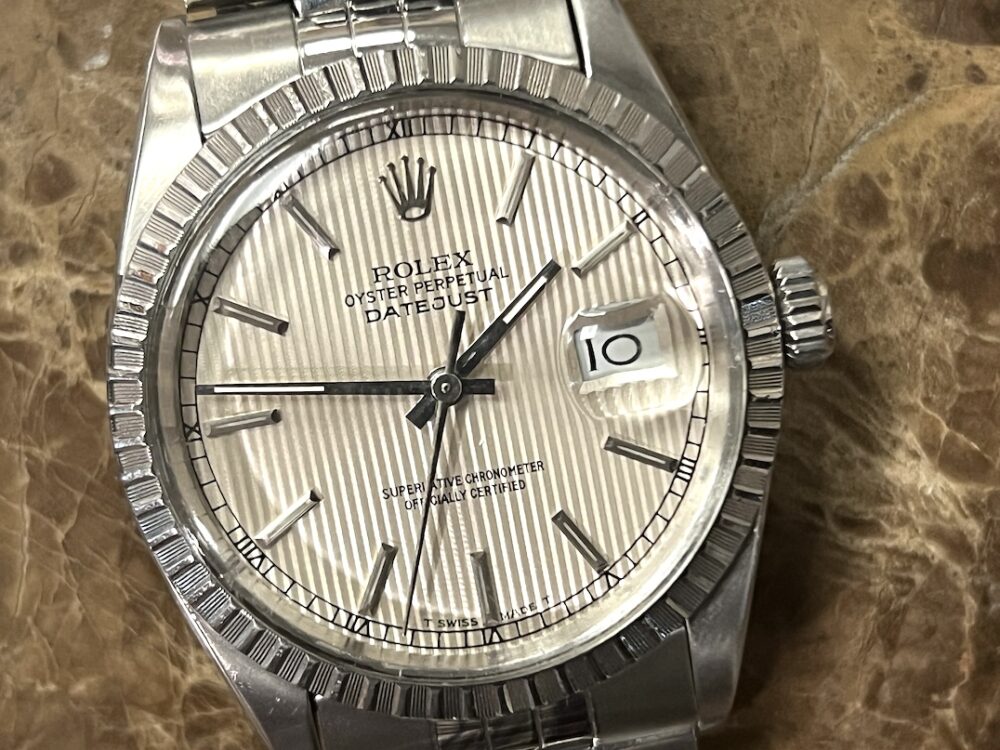 Rolex Oyster Perpetual Datejust 36 Automatic with Silver Tapestry Dial Engine Turned Bezel Jubliee Bracelet model 16030