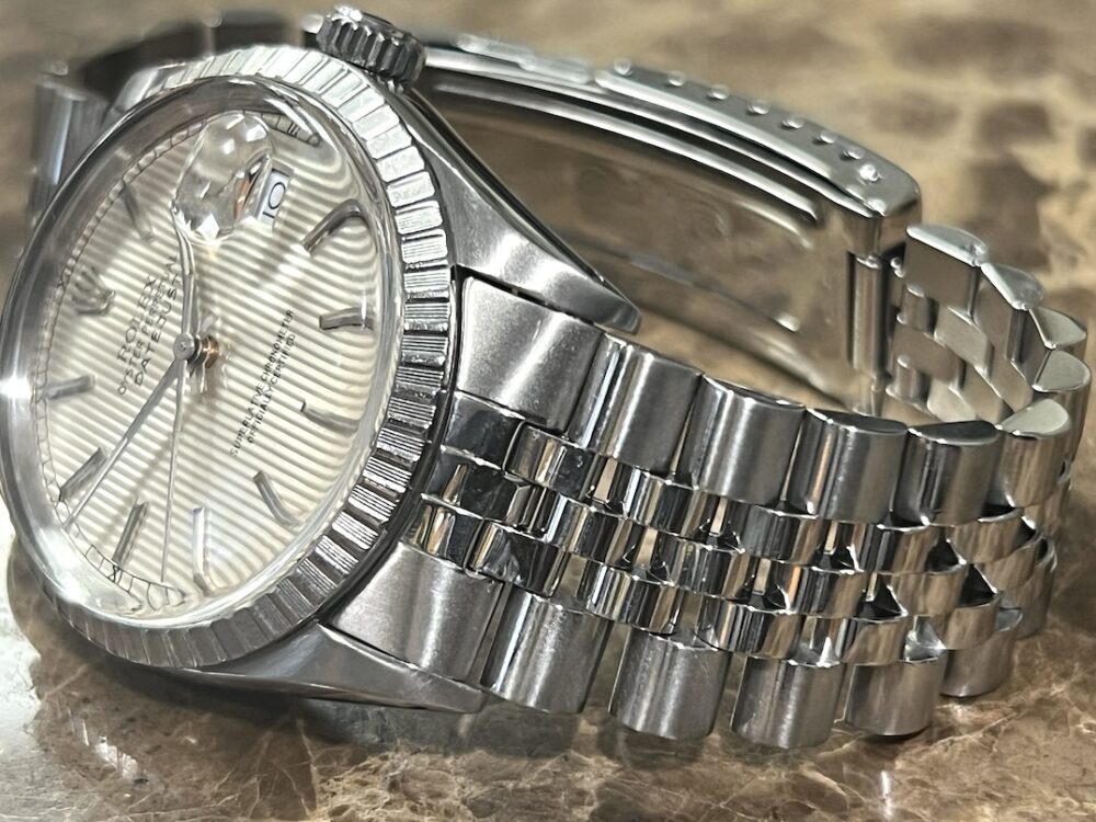 Rolex Oyster Perpetual Datejust 36 Automatic with Silver Tapestry Dial Engine Turned Bezel Jubliee Bracelet model 16030