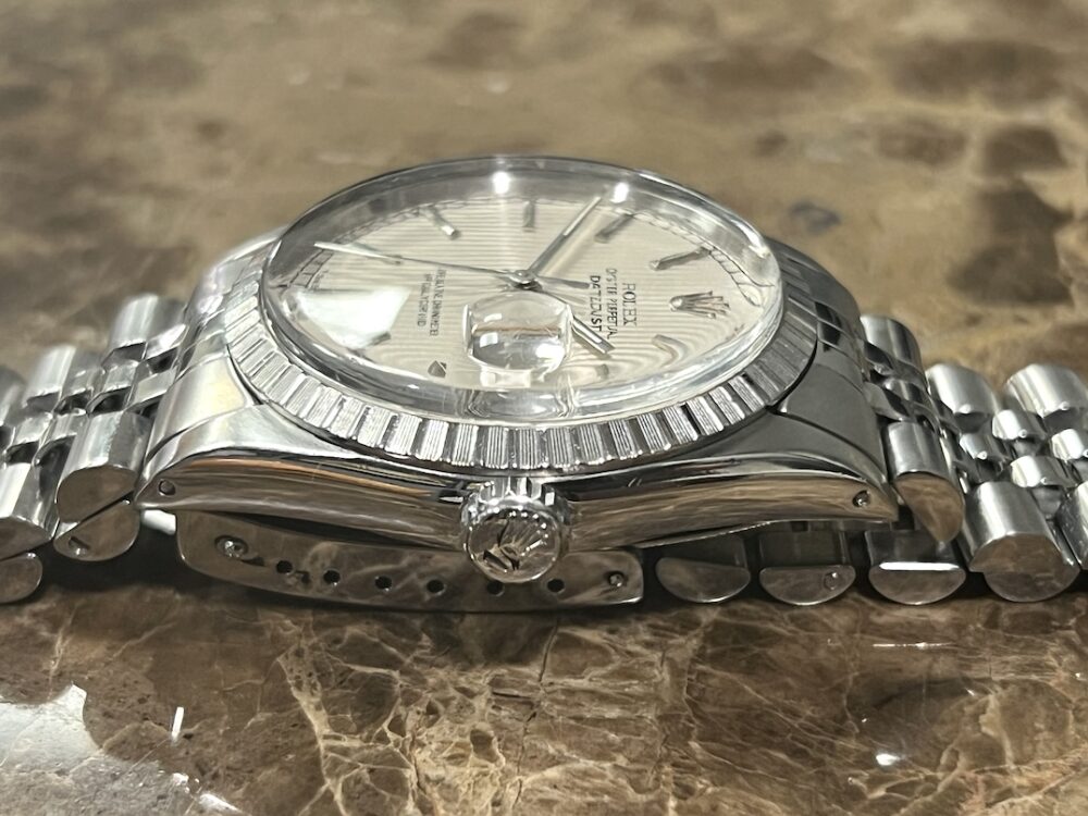 Rolex Oyster Perpetual Datejust 36 Automatic with Silver Tapestry Dial Engine Turned Bezel Jubliee Bracelet model 16030