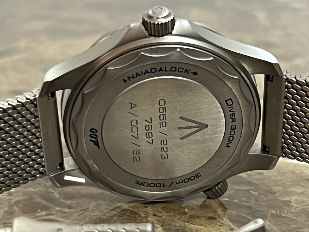 Omega SEAMASTER 300M 007 Edition Titanium Automatic 42mm Brown Dial Ceramic Bezel with Bracelet Box Papers Cards 210.90.42.20.01.001