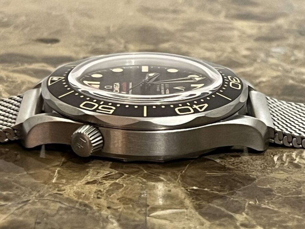 Omega SEAMASTER 300M 007 Edition Titanium Automatic 42mm Brown Dial Ceramic Bezel with Bracelet Box Papers Cards 210.90.42.20.01.001