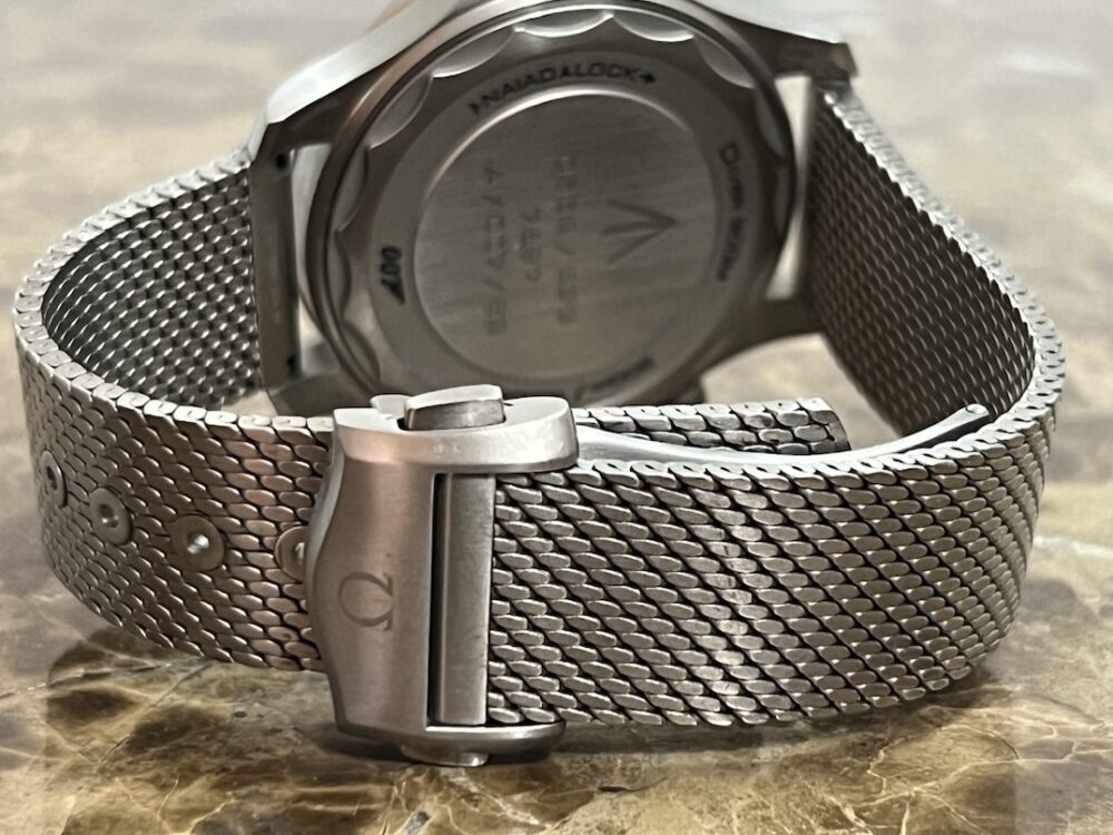 Omega SEAMASTER 300M 007 Edition Titanium Automatic 42mm Brown Dial Ceramic Bezel with Bracelet Box Papers Cards 210.90.42.20.01.001