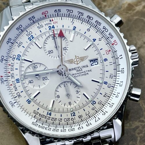 Breitling Navitimer World 46mm Automatic GMT Chronograph Silver Dial model A24322 with Box and COSC Paper