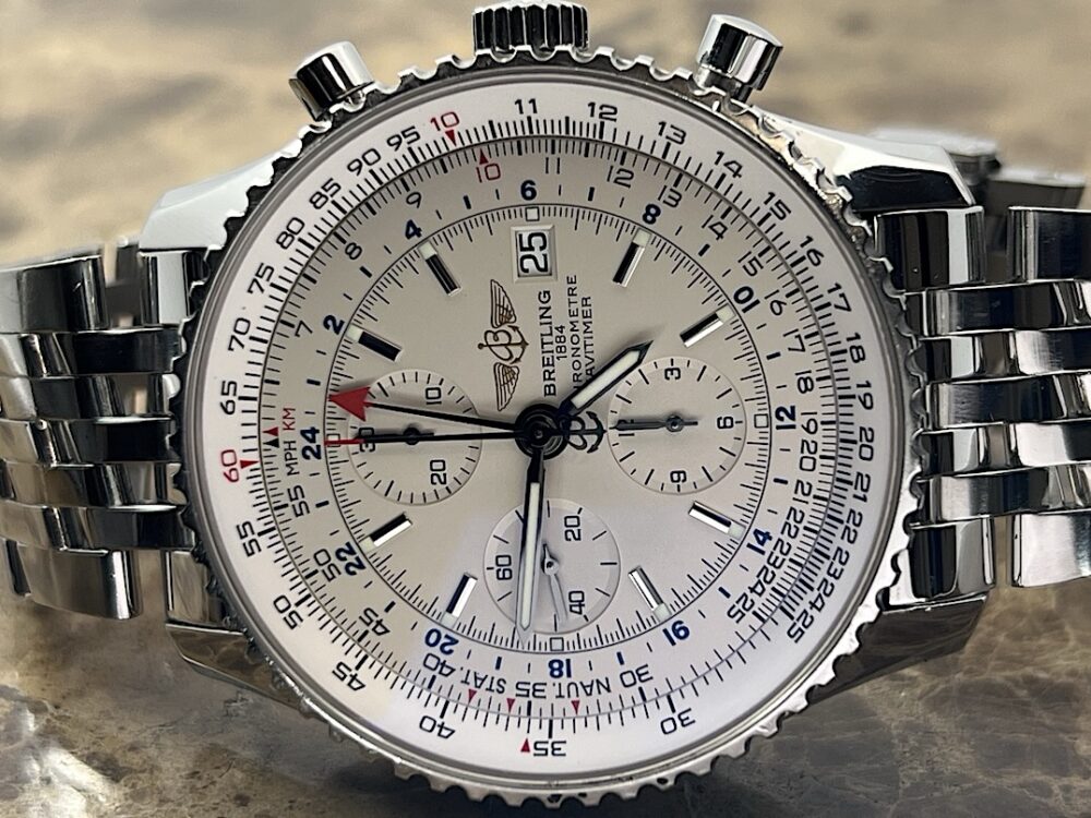 Breitling Navitimer World 46mm Automatic GMT Chronograph Silver Dial model A24322 with Box and COSC Paper