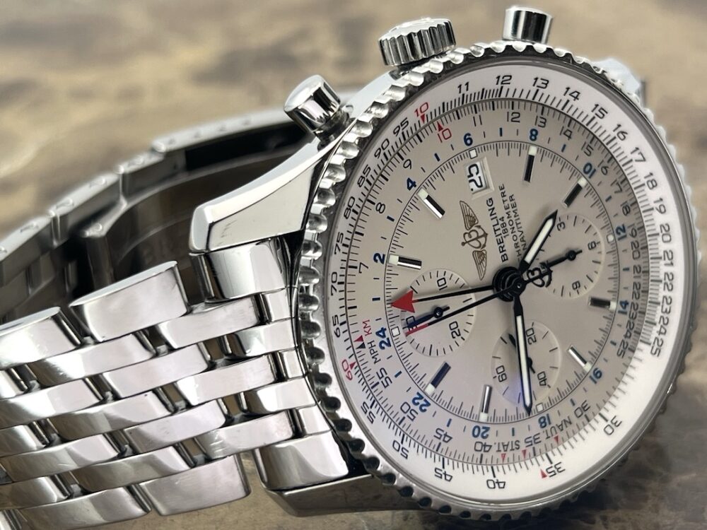 Breitling Navitimer World 46mm Automatic GMT Chronograph Silver Dial model A24322 with Box and COSC Paper