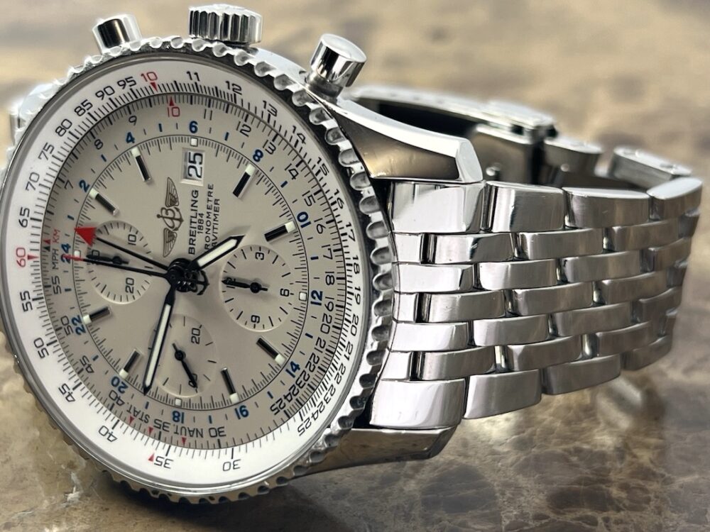 Breitling Navitimer World 46mm Automatic GMT Chronograph Silver Dial model A24322 with Box and COSC Paper