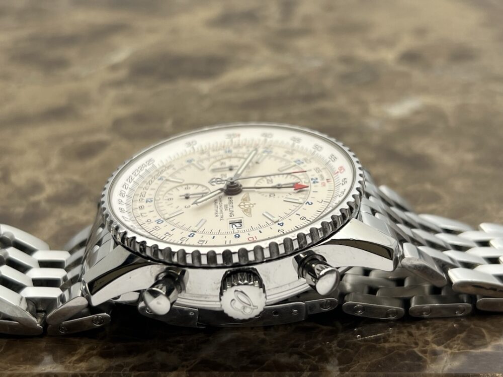 Breitling Navitimer World 46mm Automatic GMT Chronograph Silver Dial model A24322 with Box and COSC Paper