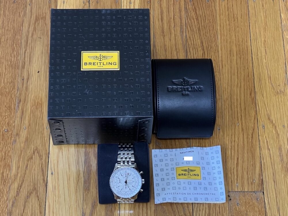 Breitling Navitimer World 46mm Automatic GMT Chronograph Silver Dial model A24322 with Box and COSC Paper