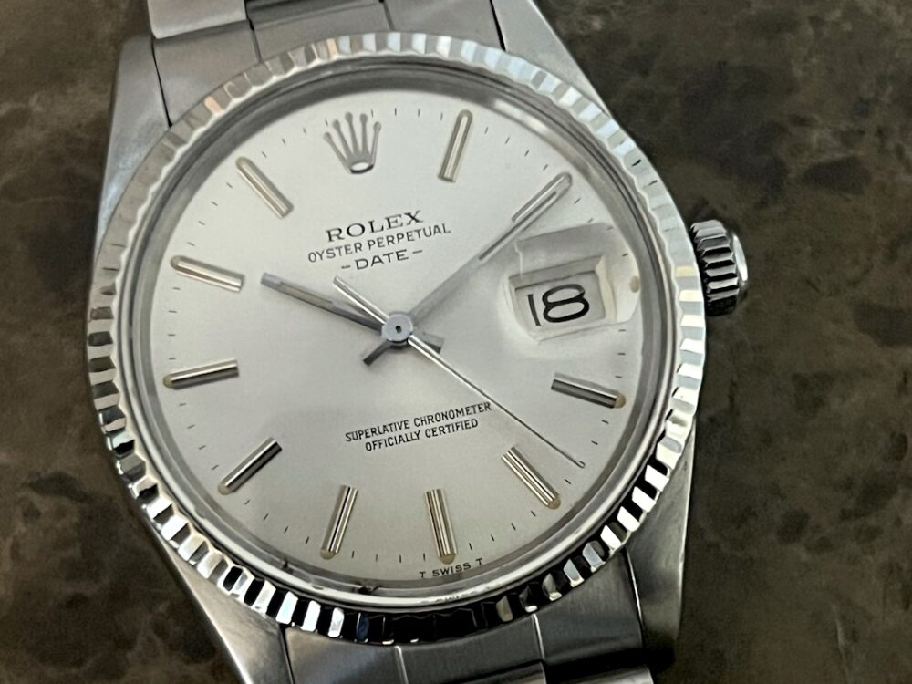 Rolex Oyster Perpetual DATE 34mm Automatic with White Gold Fluted Bezel Quick Set model 15000