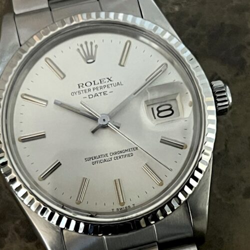 Rolex Oyster Perpetual DATE 34mm Automatic with White Gold Fluted Bezel Quick Set model 15000