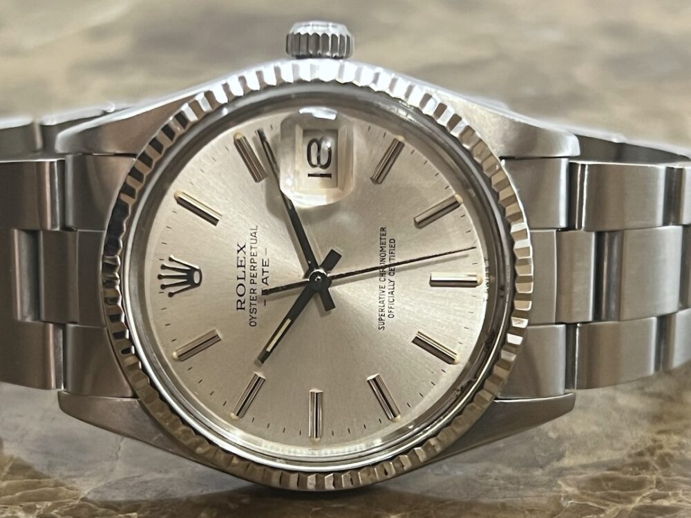 Rolex Oyster Perpetual DATE 34mm Automatic with White Gold Fluted Bezel Quick Set model 15000