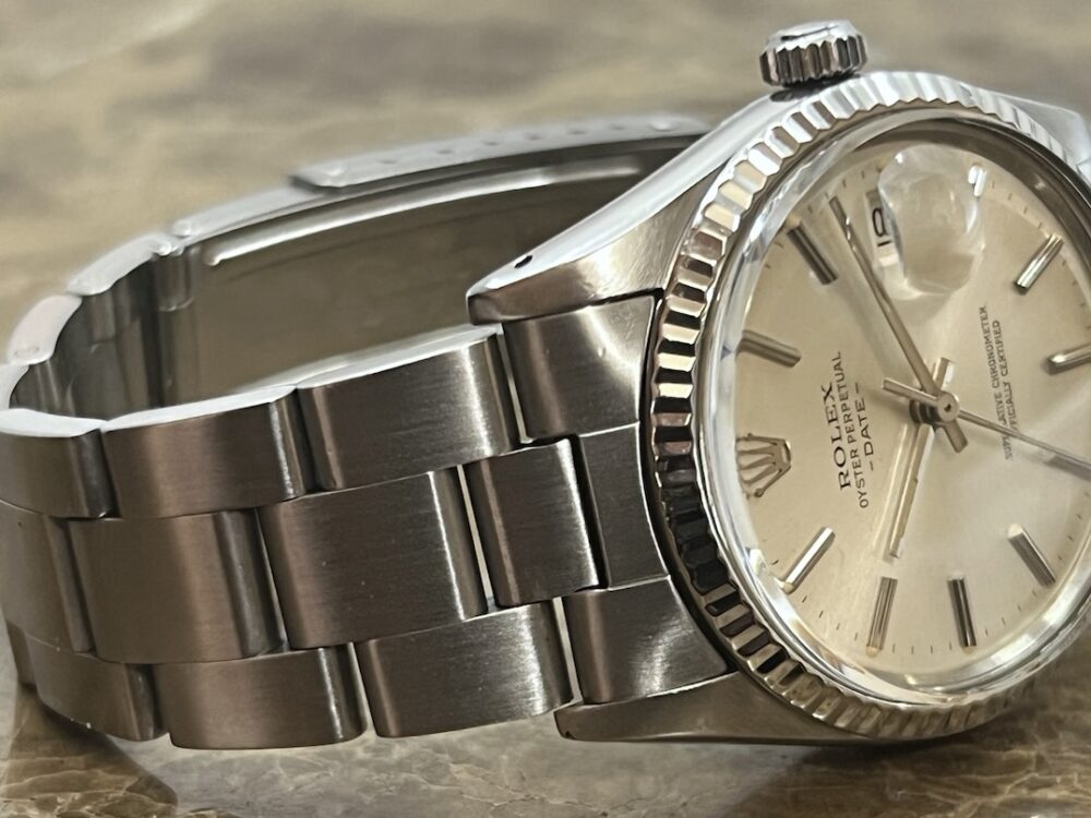 Rolex Oyster Perpetual DATE 34mm Automatic with White Gold Fluted Bezel Quick Set model 15000