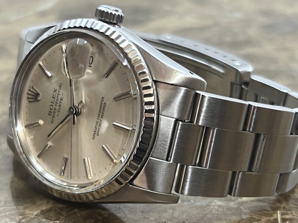 Rolex Oyster Perpetual DATE 34mm Automatic with White Gold Fluted Bezel Quick Set model 15000