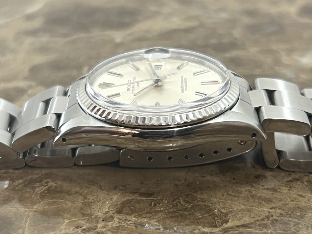 Rolex Oyster Perpetual DATE 34mm Automatic with White Gold Fluted Bezel Quick Set model 15000