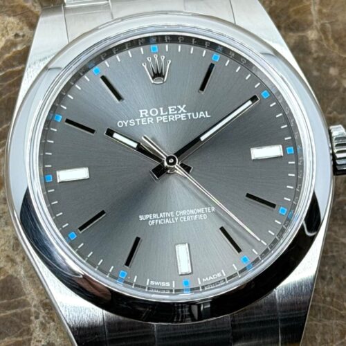 Rolex Oyster Perpetual 39mm ref 114300 Rhodium Silver Index Box Papers MINT