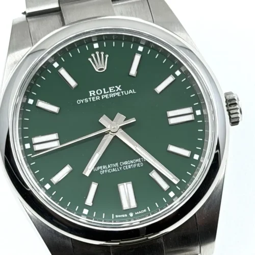 Rolex Oyster Perpetual 41 with Green Dial model 124300 Box Papers Card